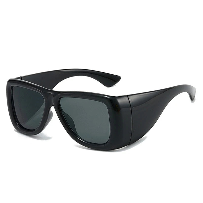 Oversized square jelly color sunglasses with wide frame design and UV400 protection for retro outdoor fashion style.
