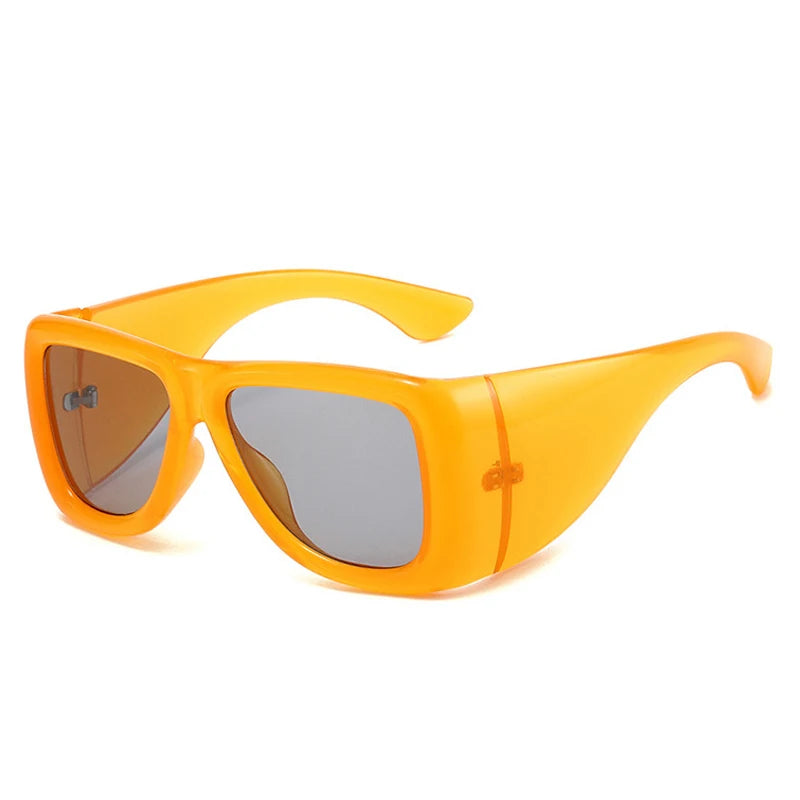 Oversized square jelly color sunglasses with wide frame design and UV400 protection for retro outdoor fashion style.