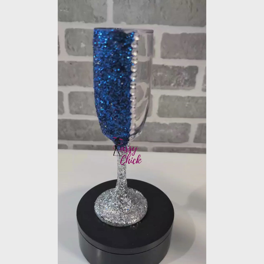Customized blue wine flute glass with glitter and rhinestones, personalized champagne glass for weddings, birthdays, and special events.