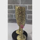 Personalized gold glitter wine flute with rhinestones. Perfect for weddings, birthdays, and special events.