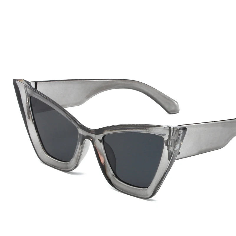 Vintage cat-eye sunglasses with square frame design for women, retro fashion eyewear for outdoor and everyday style.