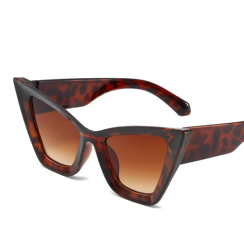 Vintage cat-eye sunglasses with square frame design for women, retro fashion eyewear for outdoor and everyday style.