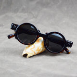 Men's vintage round acetate sunglasses with thick tortoiseshell frame