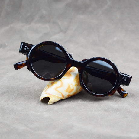 Men's vintage round acetate sunglasses with thick tortoiseshell frame