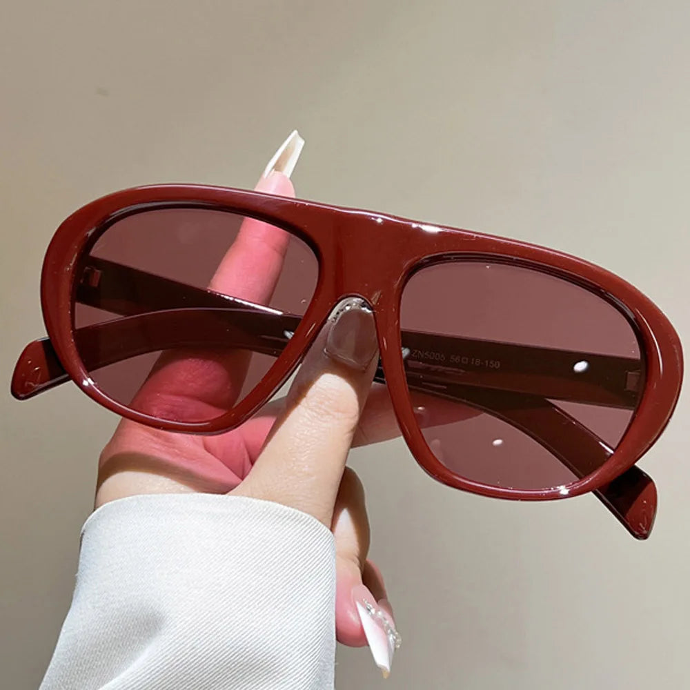 Women’s vintage sunglasses in black and red elegant design, trendy retro outdoor fashion eyewear with UV400 protection.