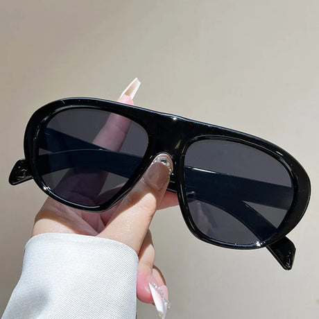 Women’s vintage sunglasses in black and red elegant design, trendy retro outdoor fashion eyewear with UV400 protection.