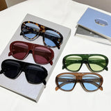 Women’s vintage sunglasses in black and red elegant design, trendy retro outdoor fashion eyewear with UV400 protection.