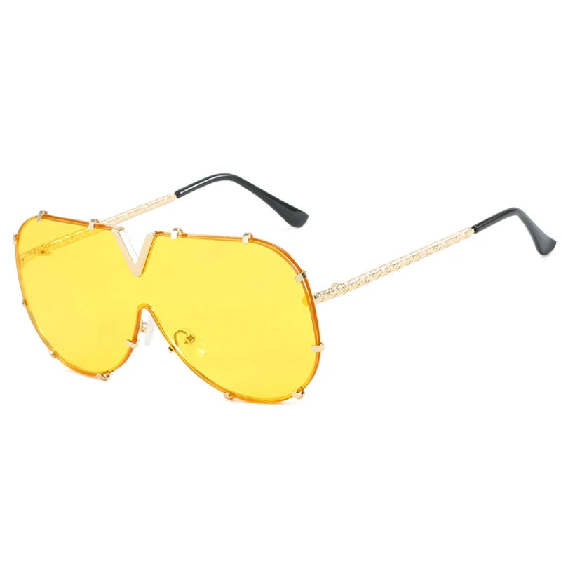 Women’s oversized pilot sunglasses with rivet metal frame and UV400 protection for driving, travel, and outdoor fashion.