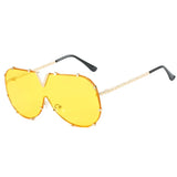 Women’s oversized pilot sunglasses with rivet metal frame and UV400 protection for driving, travel, and outdoor fashion.