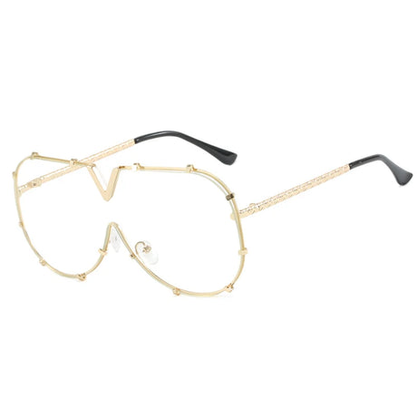 Women’s oversized pilot sunglasses with rivet metal frame and UV400 protection for driving, travel, and outdoor fashion.