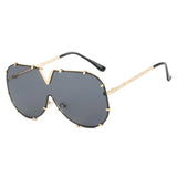 Women’s oversized pilot sunglasses with rivet metal frame and UV400 protection for driving, travel, and outdoor fashion.