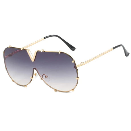 Women’s oversized pilot sunglasses with rivet metal frame and UV400 protection for driving, travel, and outdoor fashion.