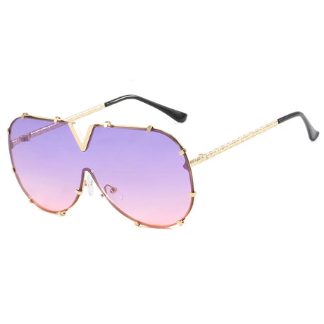 Women’s oversized pilot sunglasses with rivet metal frame and UV400 protection for driving, travel, and outdoor fashion.