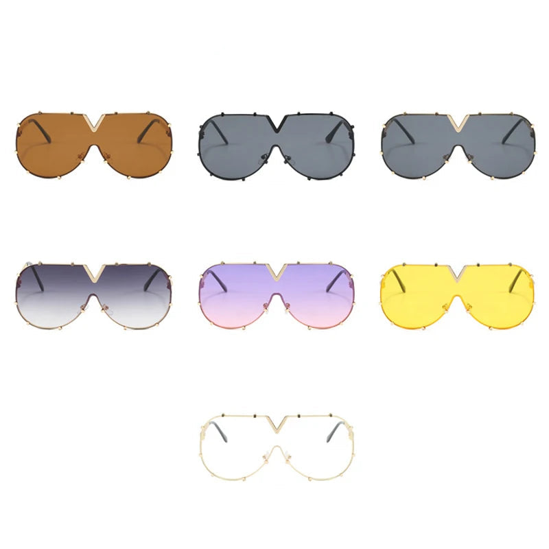 Women’s oversized pilot sunglasses with rivet metal frame and UV400 protection for driving, travel, and outdoor fashion.
