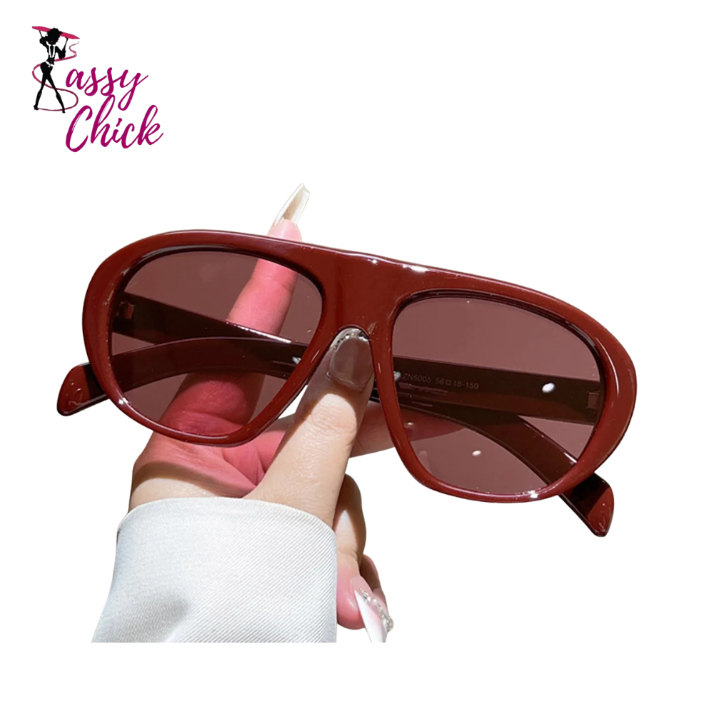 Women’s vintage sunglasses in black and red elegant design, trendy retro outdoor fashion eyewear with UV400 protection.