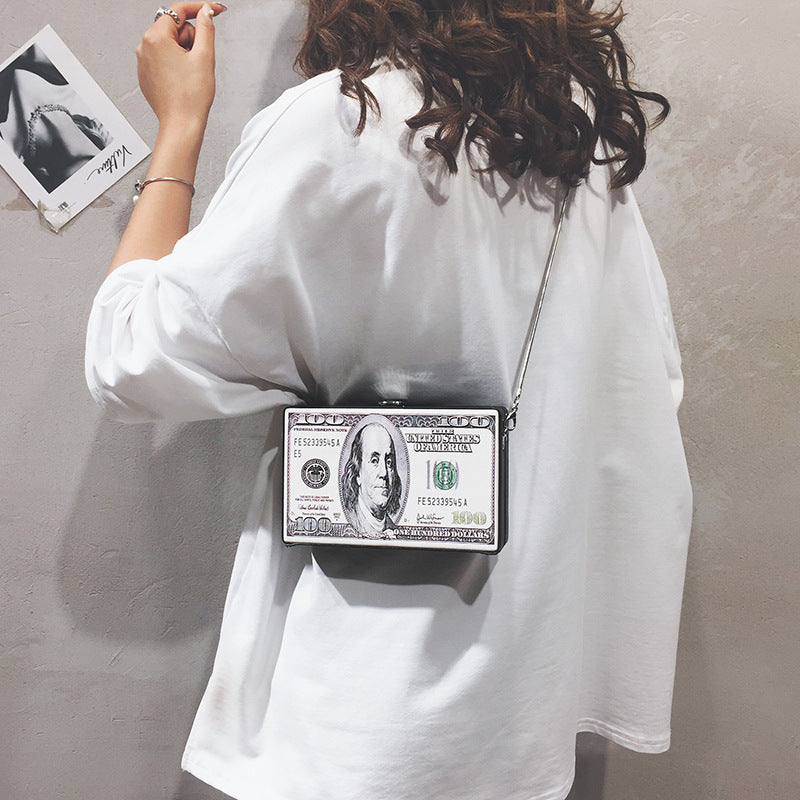 Model using Dollar Pattern Clutch Bag